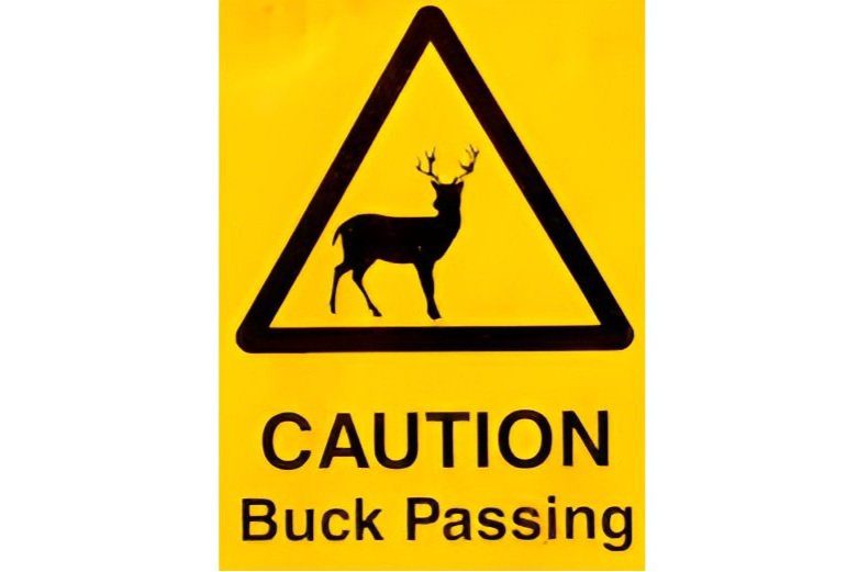 Yellow caution sign featuring a deer