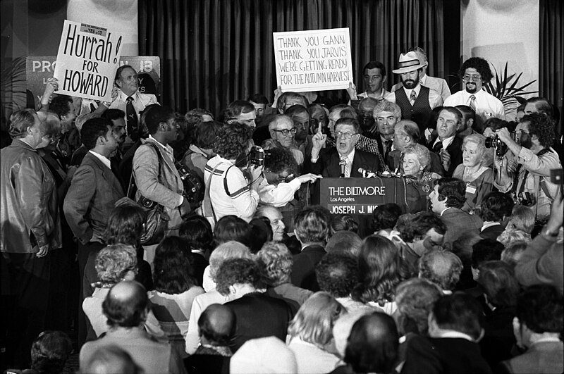 Black and white photo of a political rally.