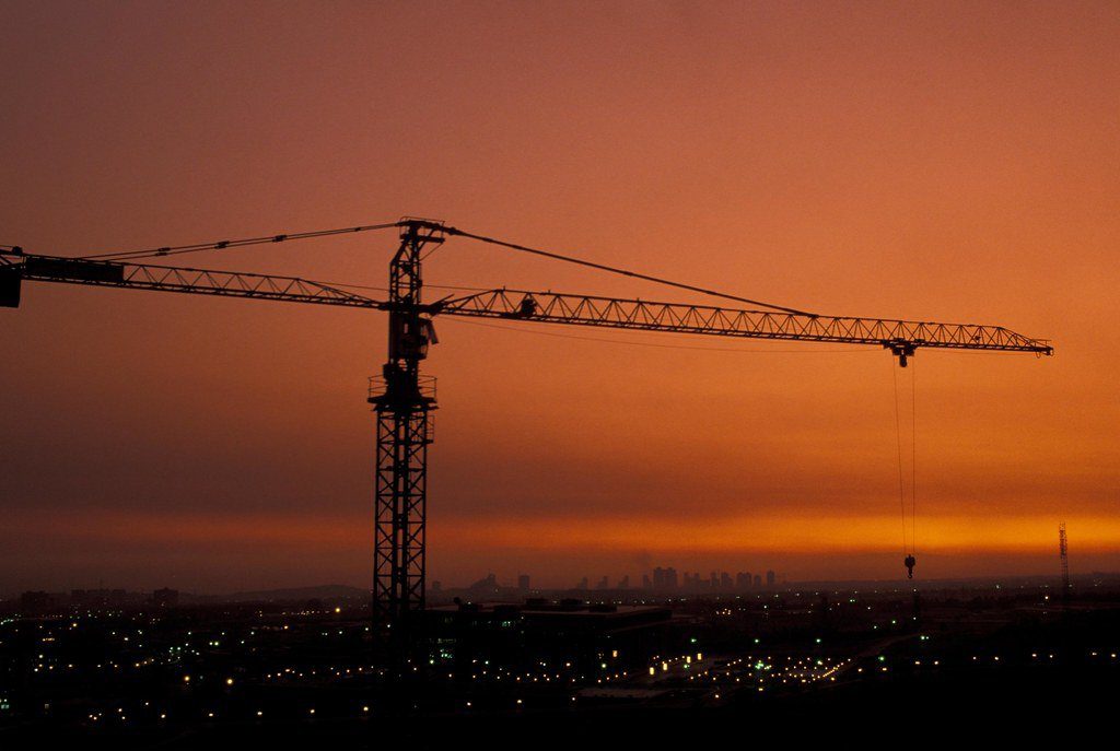 Silhouette of a crane at sunset.