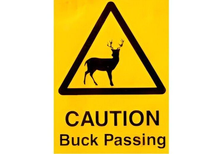 Yellow caution sign featuring a deer