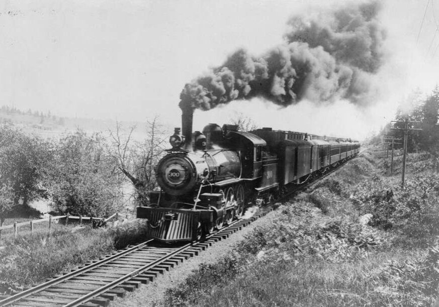 An old black and white photo of a steam train.